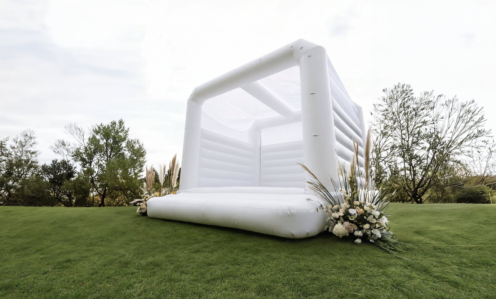 Premier Bounce white bounce house rental set up for a celebration in Tracy, California